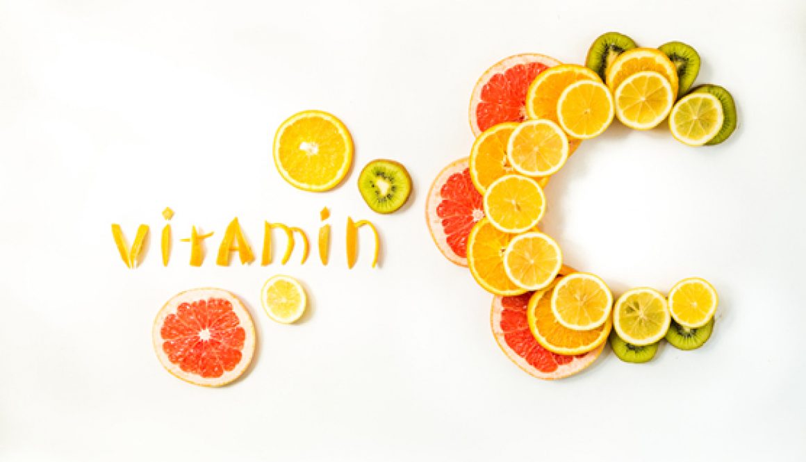 Vitamin C letters made of citrus fruits