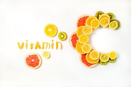 Vitamin C letters made of citrus fruits